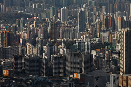 香港商业地产“撤辣”后的市场表现及其对住宅房价的启示